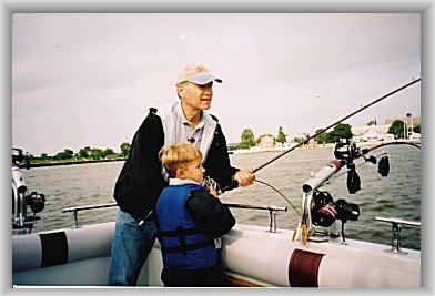 "Outdoor Wisconsin's" Dan Small assisting a young angler